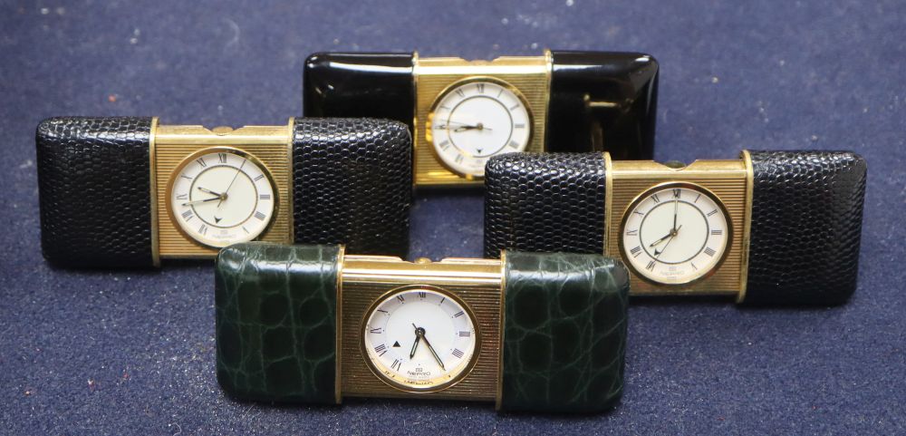 Four Nepro gilt metal cased purse alarm watches, with easel backs, each 56mm., three with leather outer cases.